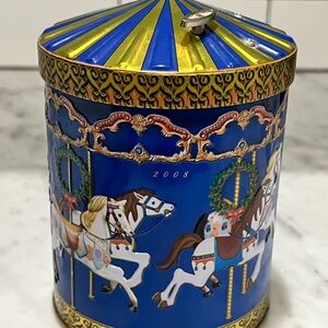 Colorful Carousel Tin Container that functions as a music box